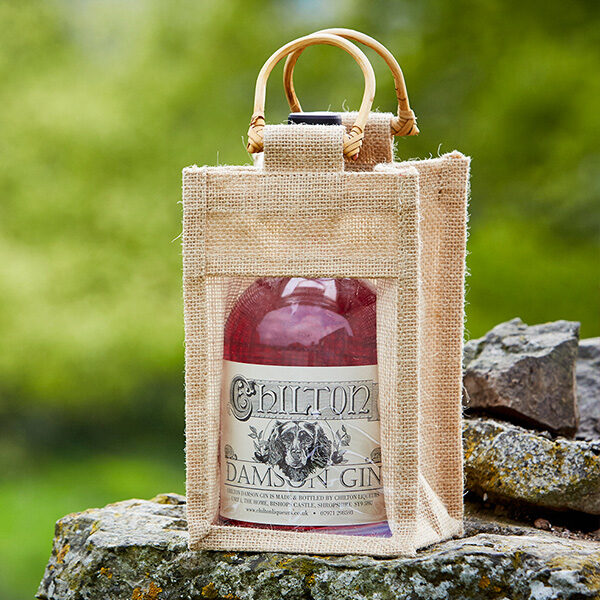 Damson gin in a bamboo carry bag